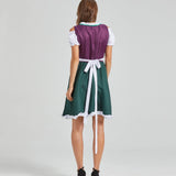 Bavarian Oktoberfest women's green and purple dirndl dress with puffed sleeves and fitted waist, showcasing traditional one-piece garment design.