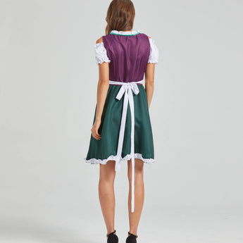 Bavarian Oktoberfest women's green and purple dirndl dress with puffed sleeves and fitted waist, showcasing traditional one-piece garment design.