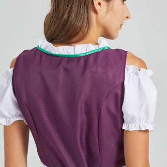 Bavarian Oktoberfest Women's Green & Purple Dirndl Dress featuring a white blouse with puffy sleeves, purple bodice with embroidered detailing, and a green skirt with a traditional apron.