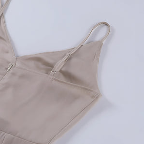 Beige adjustable strap cami summer top on display, featuring a front zipper and a versatile design ideal for warm weather.