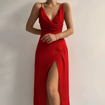A woman wearing a red sheath dress with adjustable straps and a zipper, styled with a sleeveless design, suitable for both casual and formal summer occasions.