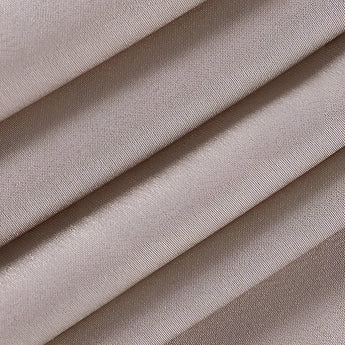 Beige adjustable strap cami featuring a zipper, made from a composite material with a subtle pattern and tints of brown and grey, ideal for versatile summer wear.