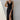 Beige adjustable strap cami worn by a woman, showcasing its versatile summer design with a zipper detail, in a Nero shade, size L. The image highlights the cami's fit and style, focusing on the upper body, arms, and neckline while partially revealing the legs.