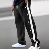 Beige chevron textured elastic waist sweatpants displayed on a model, showcasing the comfortable fit and cozy lounge style with a focus on the waistband and leg detailing.