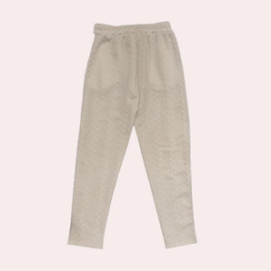 Beige chevron textured elastic waist sweatpants with pockets, designed for cozy lounging.