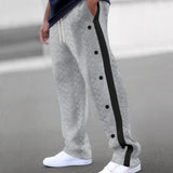 Beige chevron textured sweatpants with an elastic waistband, shown in light gray, designed for cozy lounging.