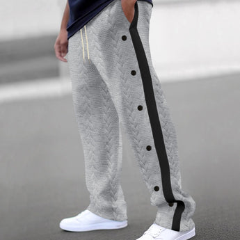 Beige chevron textured sweatpants with an elastic waistband, shown in light gray, designed for cozy lounging.