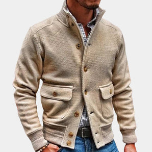 Beige corduroy men's blazer with a lightweight design, featuring a classic collar, long sleeves, and tailored fit suitable for fall fashion.