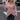 Women's pink crew neck sweater in XXL, featuring a casual fall fashion design with long sleeves, worn by a model with hair styled loose and wearing eyewear.