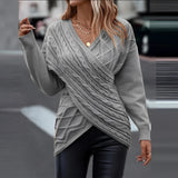 
A woman wearing a gray XXL crew neck sweater styled for casual fall fashion, with sunglasses and visible shoulder details, highlighting the outerwear as a comfortable and stylish pullover option.