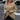 Beige crew neck sweater worn by a woman with sunglasses, featuring long sleeves and a relaxed fit suitable for casual fall fashion.