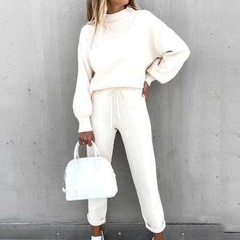 White XXL crew neck t-shirt made of soft cotton, designed for minimalist everyday wear, shown on a standing person.