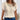 Women's summer beige crochet lace bohemian top with short sleeves and a round neckline, showcasing intricate lace detailing. This blouse is in a 5XL size, perfect for a stylish and comfortable bohemian look.