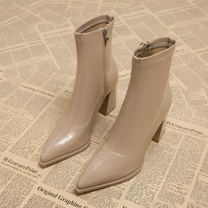 Beige high heel pointed toe ankle boots with a zipper, featuring a sleek fashion design, made from synthetic rubber and leather, displayed in an apricot shade, size 40.