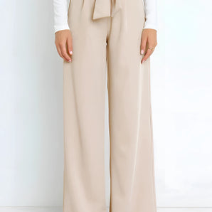 Beige high-waisted wide-leg palazzo pants designed for elegant office or summer wear, shown in an XL size.