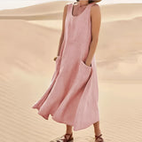 Pink 5XL eco-friendly beige linen dress featuring short sleeves, knee-length hem, and convenient pockets, designed for comfortable summer fashion.