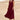 Dark red linen dress with a relaxed fit, featuring short sleeves, a round neckline, and practical pockets. This eco-friendly summer dress falls to the knee, offering a fashionable and comfortable style suitable for casual daytime wear.