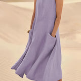 Beige linen dress with pockets, eco-friendly summer fashion, shown in Viola color, size 5XL. Dress has short sleeves and a comfortable waistline.