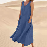 Electric blue linen dress featuring a one-piece design with a knee-length cut, short sleeves, and a defined waist.