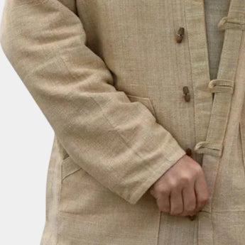 Beige linen mandarin collar shirt with long sleeves, designed for a lightweight summer style, shown on a mannequin.