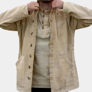 Beige linen mandarin collar shirt with long sleeves, lightweight fabric ideal for summer wear, displayed against a neutral background.