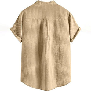Beige men's short sleeve pleated shirt with a relaxed fit, displayed on a clothes hanger.