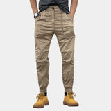 Men's beige slim fit cargo pants in khaki color, size 3XL, featuring a durable multi-pocket design suitable for outdoor wear.