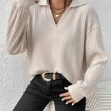 Beige oversized chunky knit sweater with a prominent collar, designed for women's winter casual wear in an apricot color, size XL.