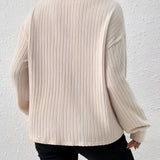 Beige oversized collar chunky knit sweater for women, featuring a cozy and casual style, with long sleeves and a textured knit pattern, perfect for winter wear.