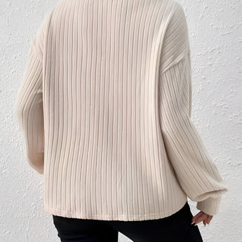 Beige oversized collar chunky knit sweater for women, featuring a cozy and casual style, with long sleeves and a textured knit pattern, perfect for winter wear.