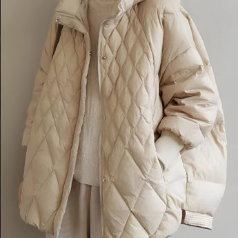 Beige oversized hooded puffer jacket in lightweight material, featuring long sleeves and a high collar, displayed in a khaki color, size large.