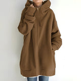 Brown oversized zip-up hoodie dress for women in 2XL, featuring a beige hue, with visible shoulder and sleeve details, a collar, and functional pockets suitable for autumn wear.