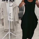 Beige sleeveless linen midi dress displayed on a mannequin, showcasing its elegant and casual summer fashion style.