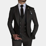 Beige slim fit men's three-piece suit, with a blazer, dress shirt, tie, and coat, showcasing modern formal wear styling.