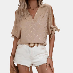 Beige split-sleeve V-neck blouse with metallic thread, featuring casual chic summer style.