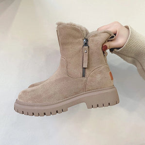 Beige suede women's winter boots with a zipper closure, featuring a fluffy lining and a non-slip sole.