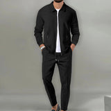 A beige textured men's tracksuit set featuring a lightweight jacket with a collar and long sleeves, paired with matching joggers.