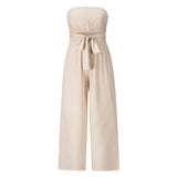 Beige sleeveless jumpsuit with a tie-waist design, suitable for elegant casual summer wear, in apricot color and size 2XL.