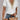 White V-neck blouse with lace trim and boho design, featuring long sleeves and elegant casual style, size 2XL.