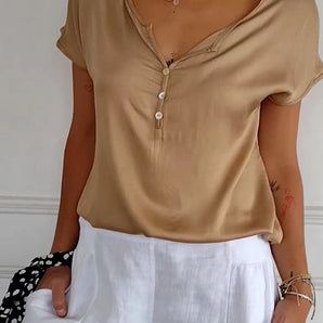 Beige V-neck short sleeve button-up blouse in a relaxed fit, suitable for summer casual wear.