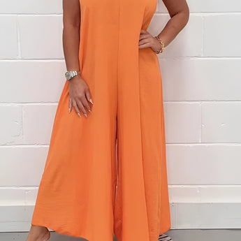 Orange V-neck wide-leg jumpsuit in size 2XL, featuring elegant formal summer chic design with short sleeves and a defined waistline.