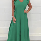 Green V-neck wide-leg jumpsuit in size 2XL, featuring elegant shoulder detailing and a tailored waist, ideal for formal summer occasions.