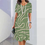 
A knee-length formal dress in a beige wave pattern, designed for office wear, featuring short sleeves and a fitted waist. The dress is styled with a round neckline and falls gracefully to the knees.