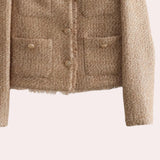 Beige women's bouclé double-breasted blazer featuring long sleeves, a stylish collar, and a woolen texture, designed as fashionable fall outerwear.
