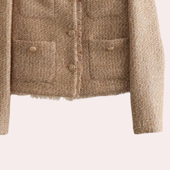 Beige women's bouclé double-breasted blazer featuring long sleeves, a stylish collar, and a woolen texture, designed as fashionable fall outerwear.