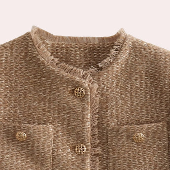 Beige women's bouclé double-breasted blazer featuring long sleeves, a structured collar, and a chic woolen pattern, ideal for fall outerwear fashion.