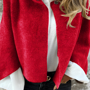 Beige women's cropped fleece jacket featuring a soft and elegant design with a lightweight texture. The jacket includes long sleeves, a structured collar, and is tailored to fit at the waist.
