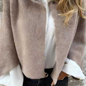 Women's beige cropped fleece jacket in size 3XL, featuring a soft and elegant design with a collar, full-length sleeves, and a comfortable fit around the waist.