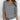 Lightweight gray women's knit sweater in size 5XL featuring a scoop neckline and 3/4 sleeves, displayed on a mannequin or model.