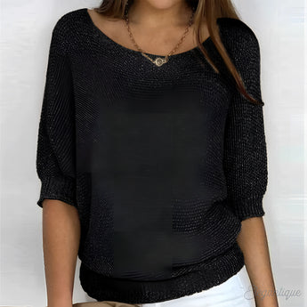 Black women's lightweight 3/4 sleeve scoop neck knit sweater in size 5XL, displayed on a model showcasing the garment's fit and style.